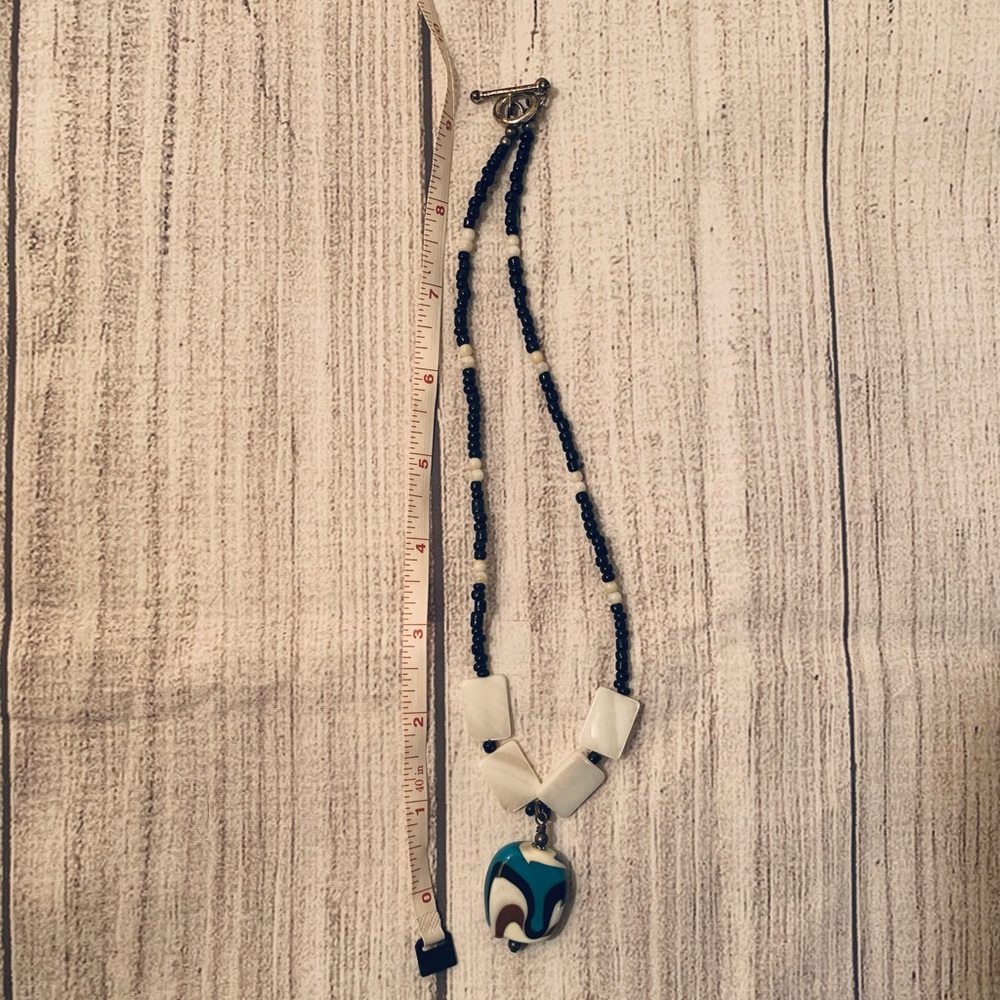 Black Beaded Necklace with Clay White and Blue Pendant